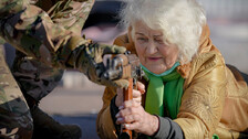 Valentyna Konstantynovska, 79 years-old, holds a weapon during basic combat training for civilians, organized by the Special Forces Unit Azov, of Ukraine's National Guard, in Mariupol, Donetsk region, eastern Ukraine.  | AP Photo/Vadim Ghirda